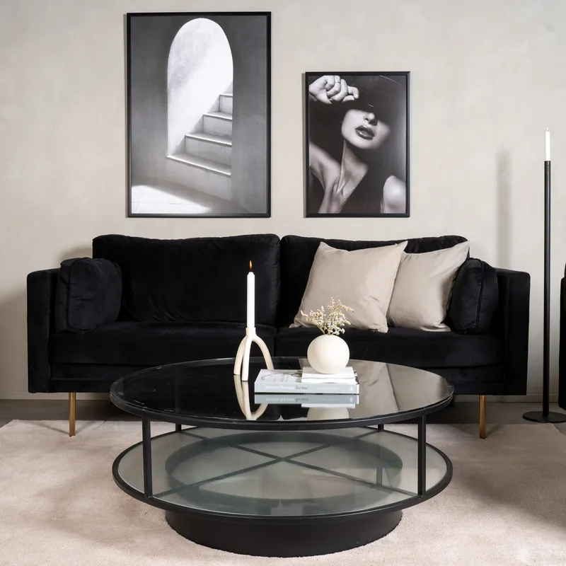 Table basse ronde Falsterbo, plateau et tablette en verre sur structure et socle noirs, vue de face