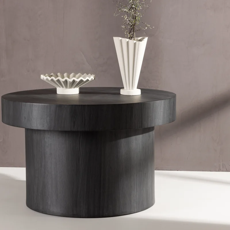 Table basse ronde Malung noire sur large pied cylindrique, vue de face
