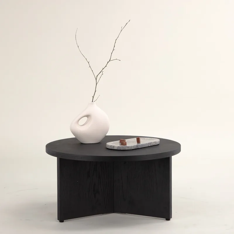 Grande table basse ronde Saltö plaqué noir sur pied en panneaux croisés, vue de face
