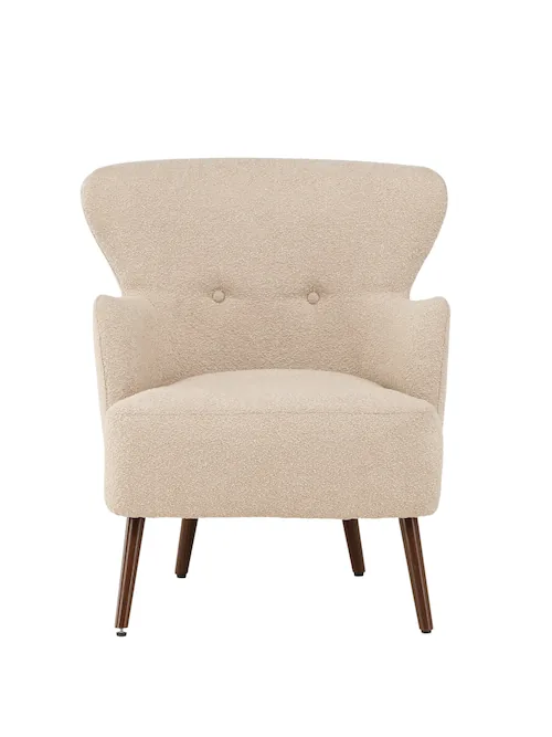 Fauteuil à dossier évasé Lincoln en bouclette beige, vu de face avec deux boutons au dossier