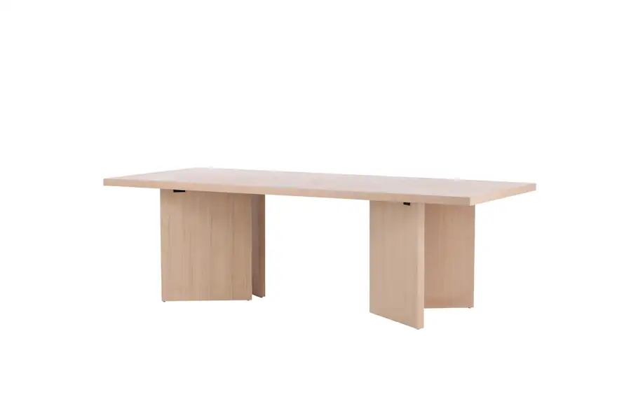 Grande table à manger blanchie vue de trois quarts avant