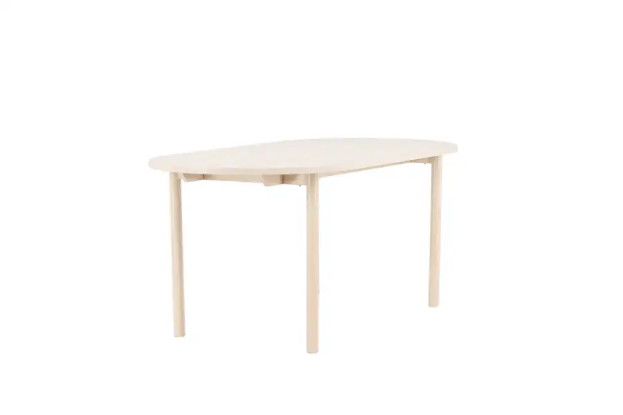 Table à manger ovale en bois blanchi vue de trois quarts