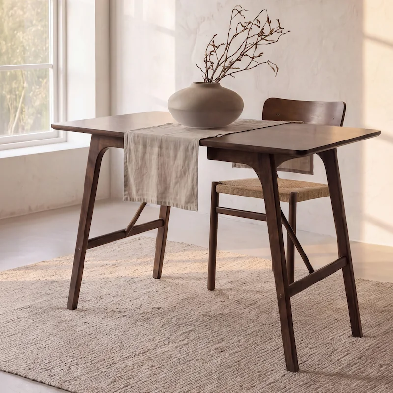 Table à manger rectangulaire Kaseidon brun foncé vue de face, pieds écartés