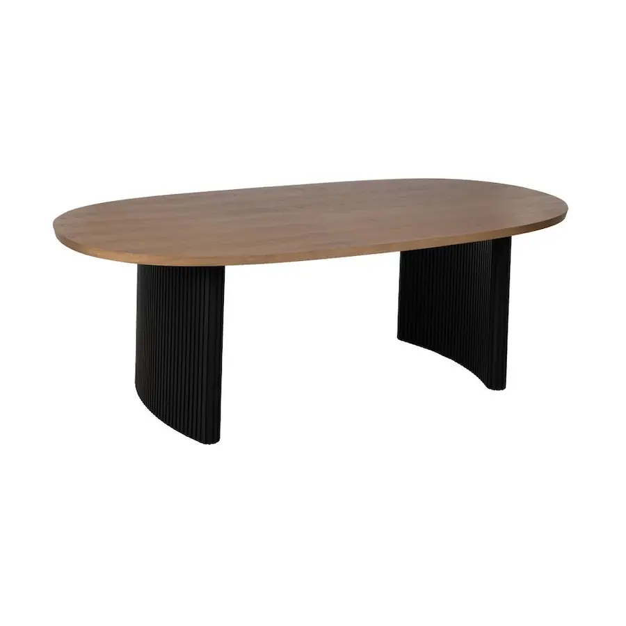 Table à manger ovale à plateau brun et deux pieds noirs cannelés, vue de trois quarts sur fond blanc
