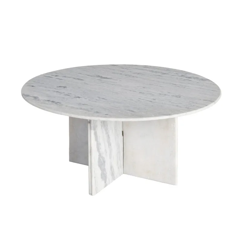 Table basse ronde en pierre blanche veinée de gris Ixia, pied en croix, fond blanc